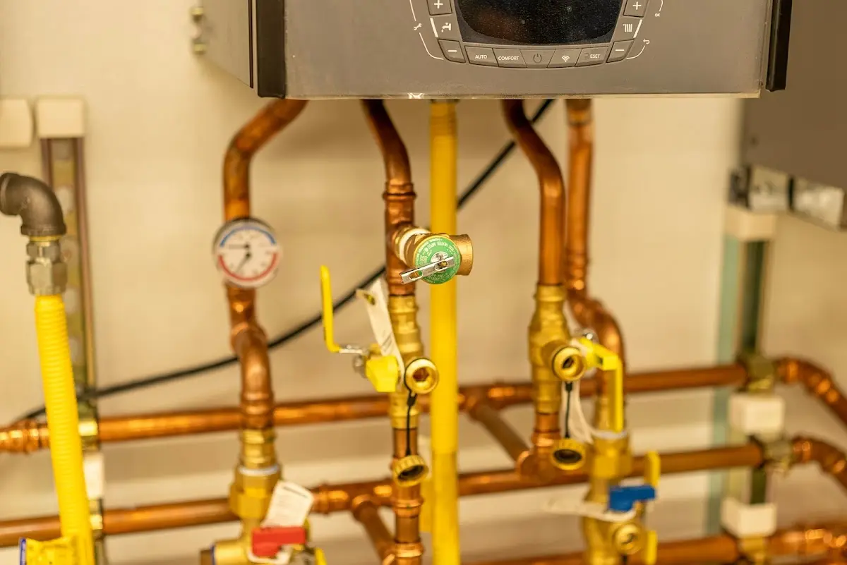 Licensed technician providing Backflow Prevention for a homeowner in Sandy Springs